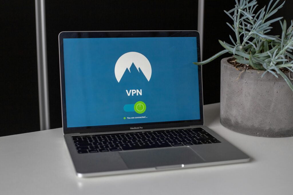 Grey and Black MacBook Pro Showing a VPN being connected